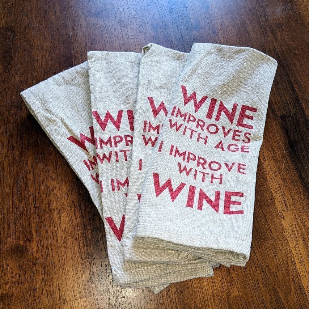 'Wine improves with age. I improve with wine.' Tea towel set (x4)